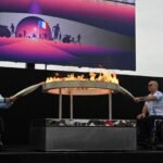 Paris Paralympics flame is lit before journey for English village.